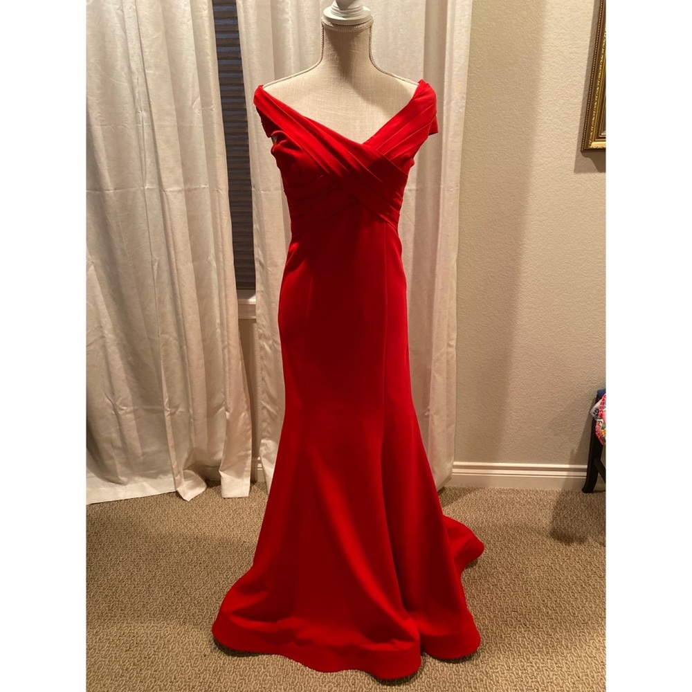 Red off shoulder mermaid cut evening gown